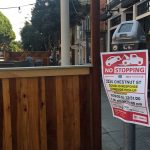 A curbside pickup zone and outdoor dining area during COVID-19