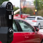 Parking meter near a busy street