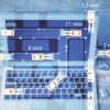 Abstract graphic of vehicle icons with routes and time estimates overlaid on a photo of a laptop on a desk